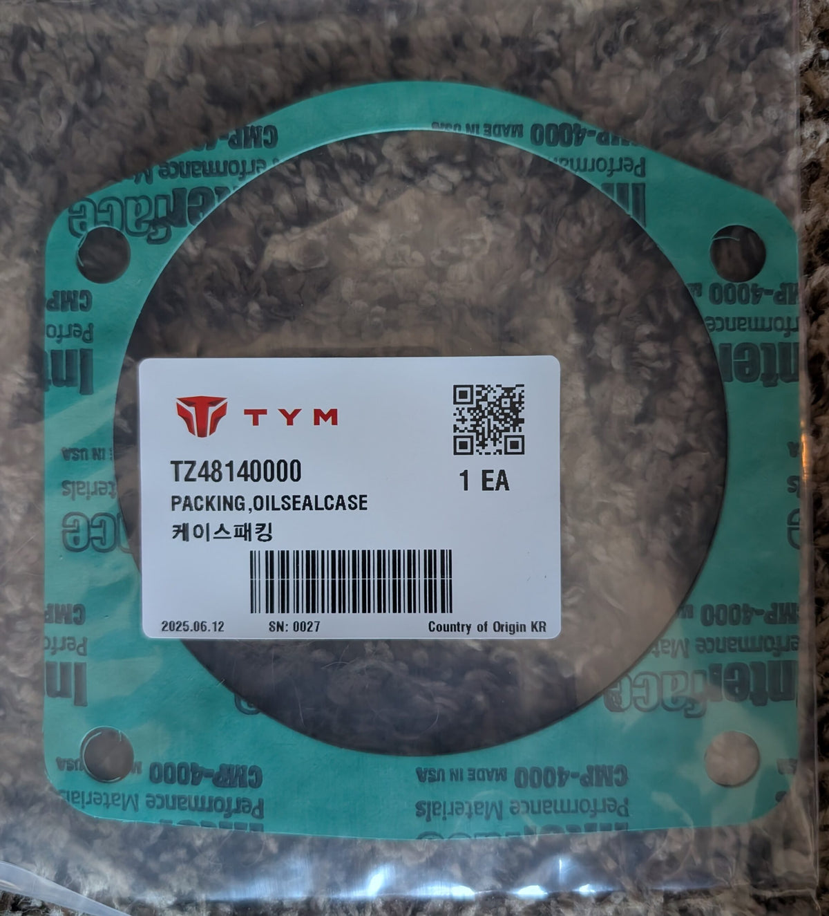 TZ48140000 - PACKING, OIL SEAL CASE image 0